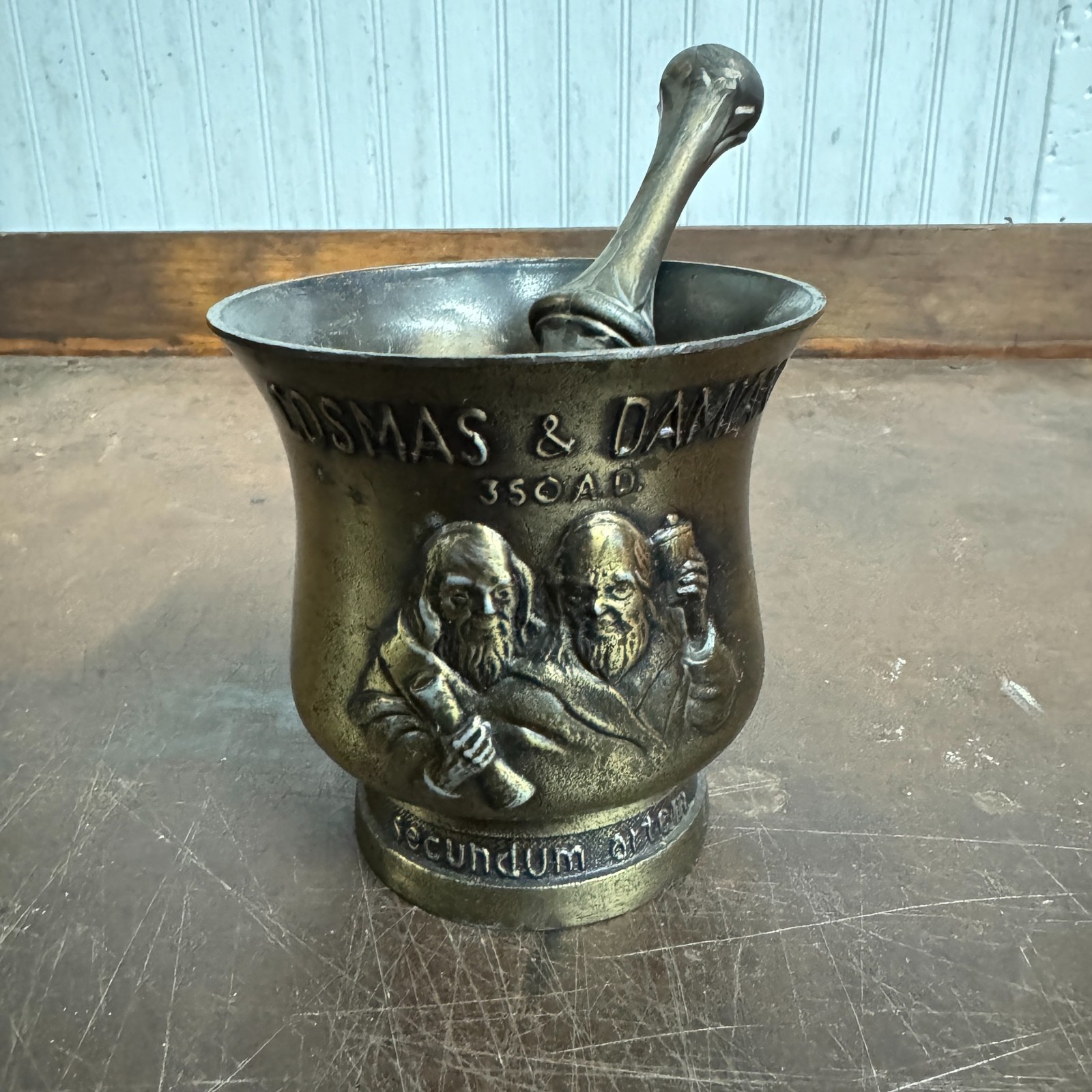 Vtg CORICIDIN Advertising Motor & Pestle Apothecary / Pharmacy – Cosmas & Damian