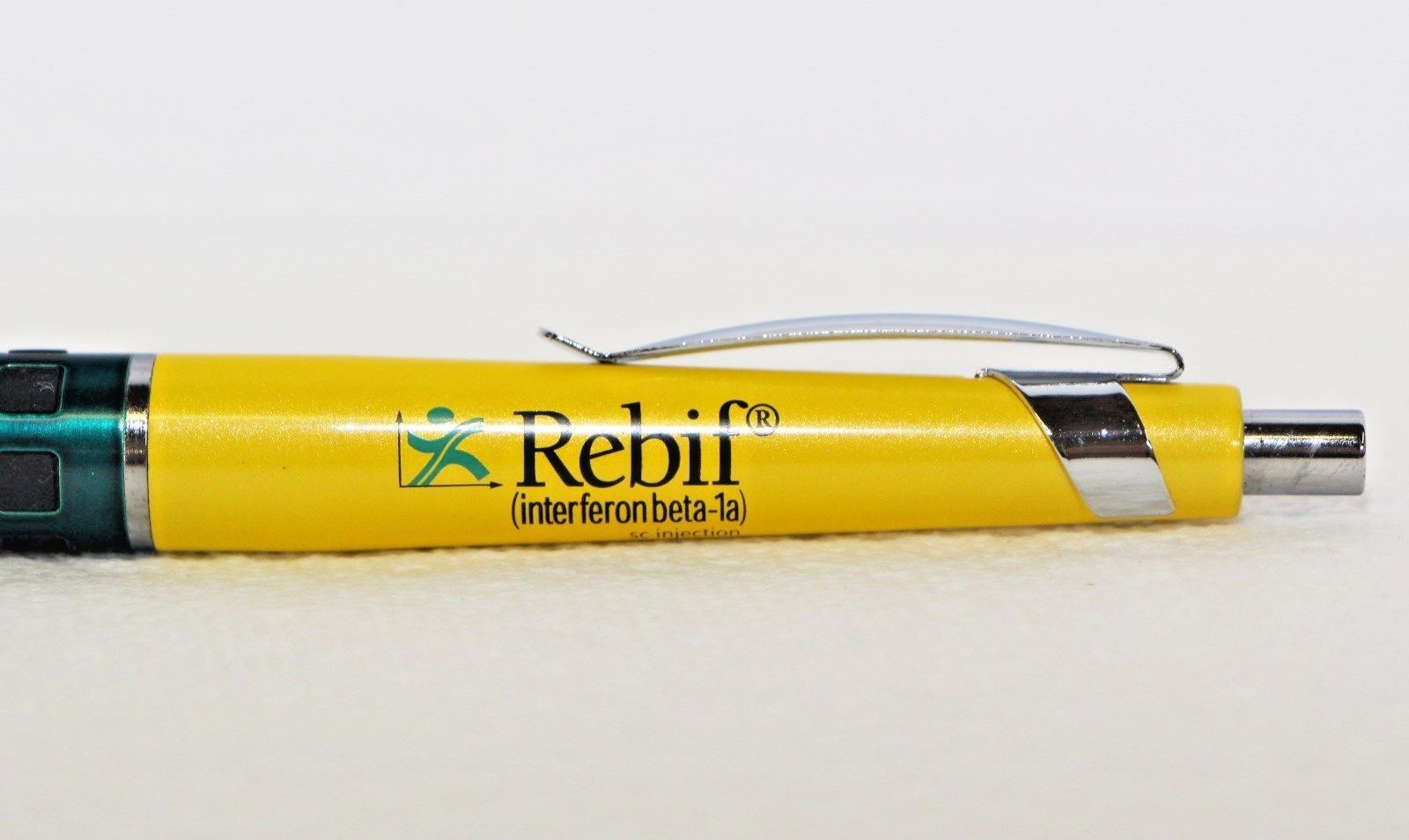 Heavy Metal REBIF Pharmaceutical Pen Yellow and Green New in Sleeve Torpedo