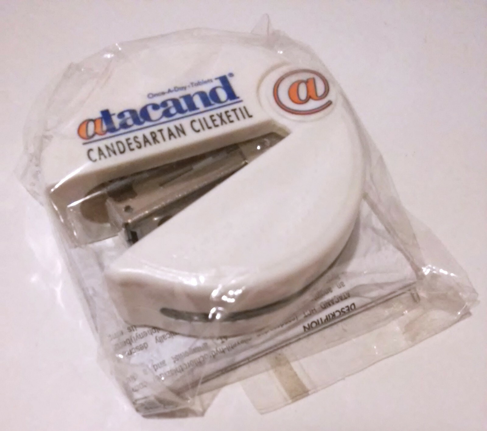 RARE NEW SEALED DRUG REP ATACAND CANDESARTAN CILEXETIL WHITE PAPER STAPLER