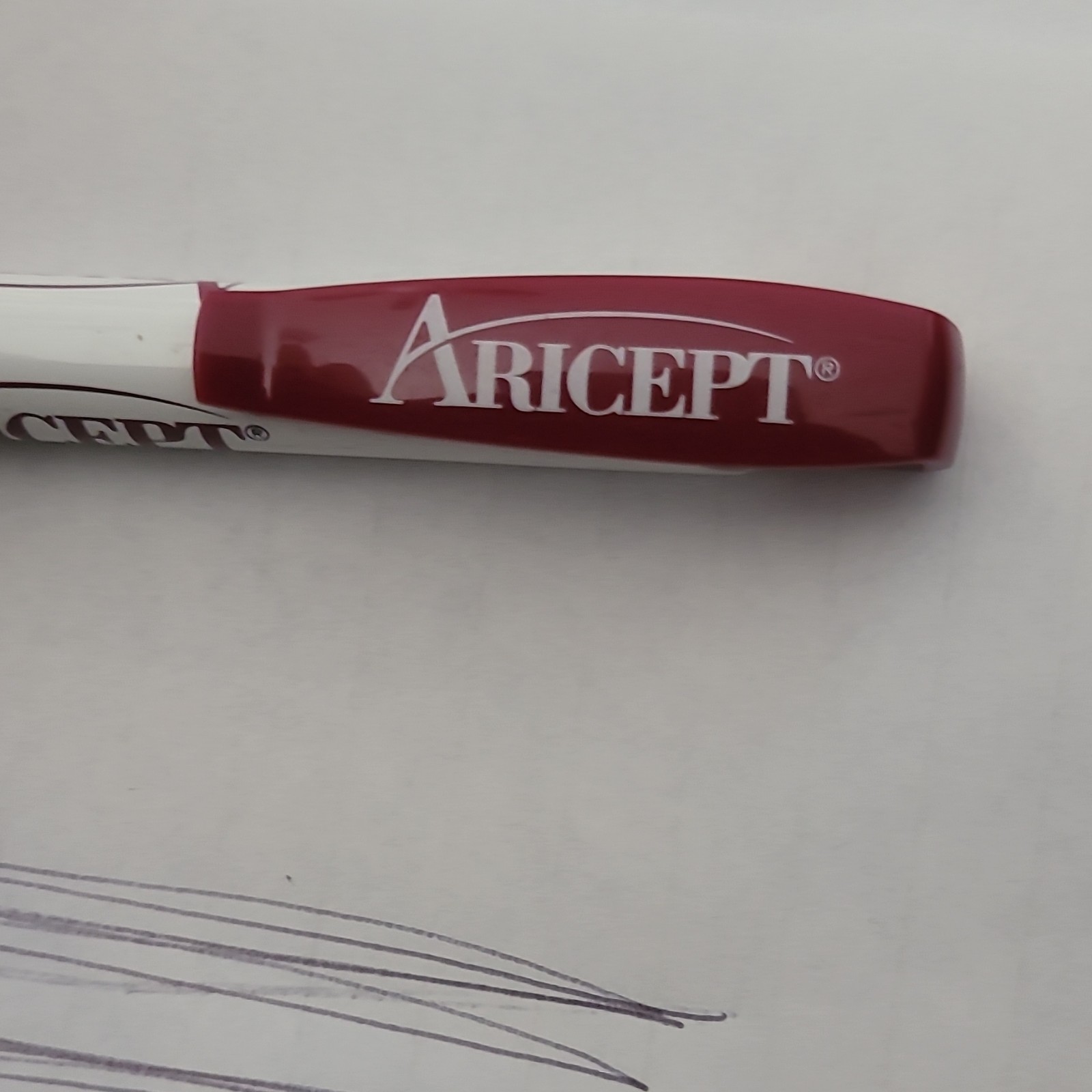 Aricept Donepezil HCl Drug Rep Pharmaceutical Ballpoint Pen White & Red