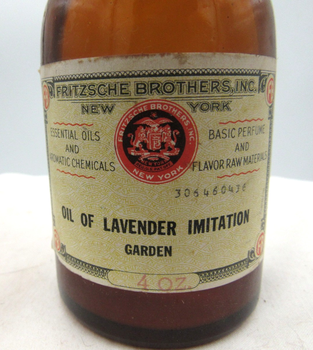 BW – 1930’s Fritzsche Bros NY Oil of Lavender 4 1/2″ Amber Medicine bottle