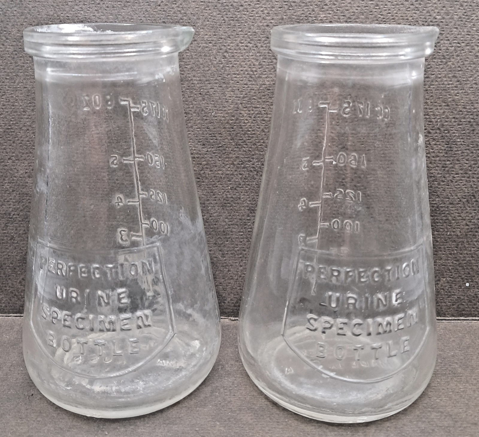 Pair of 6oz Vintage “Protex” Perfection Glass Urine Specimen Bottles 41 Stamp