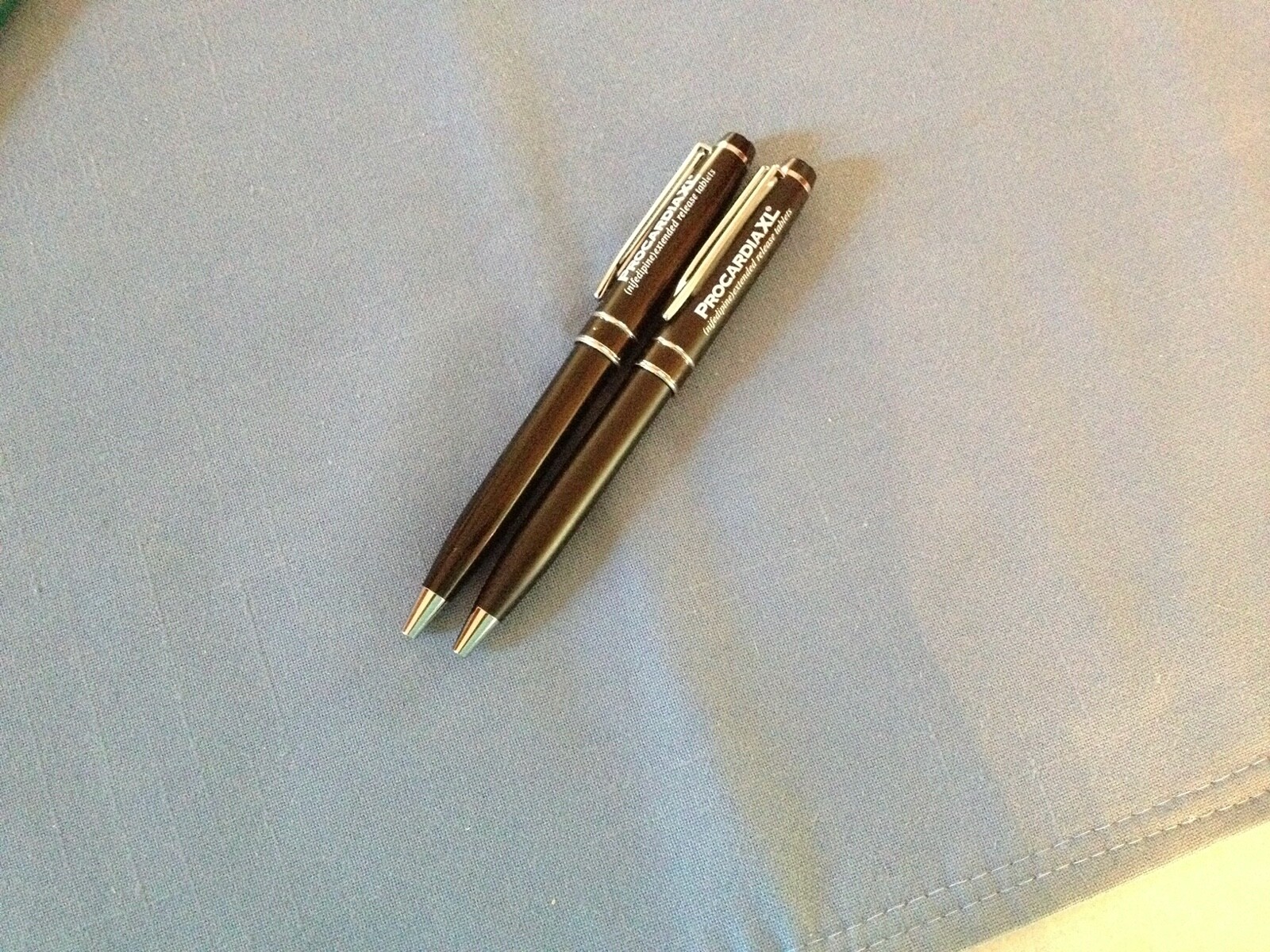 2 metal Procardia drug rep pens