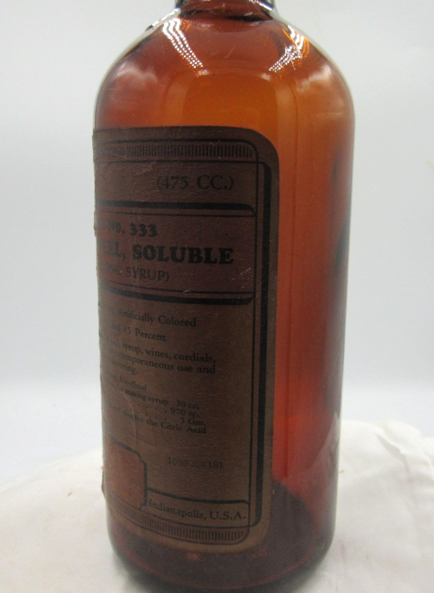 MM – 1940’s Eli Lilly Orange Peel Soluble Indianapolis 8″ Amber Medicine bottle