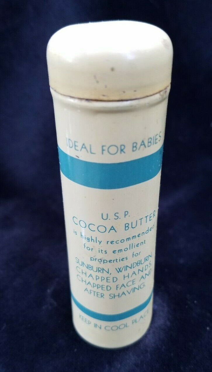 Old Advertising Medicine Tin USP Pure Cocoa Butter Woltra Co NY Push Dispenser