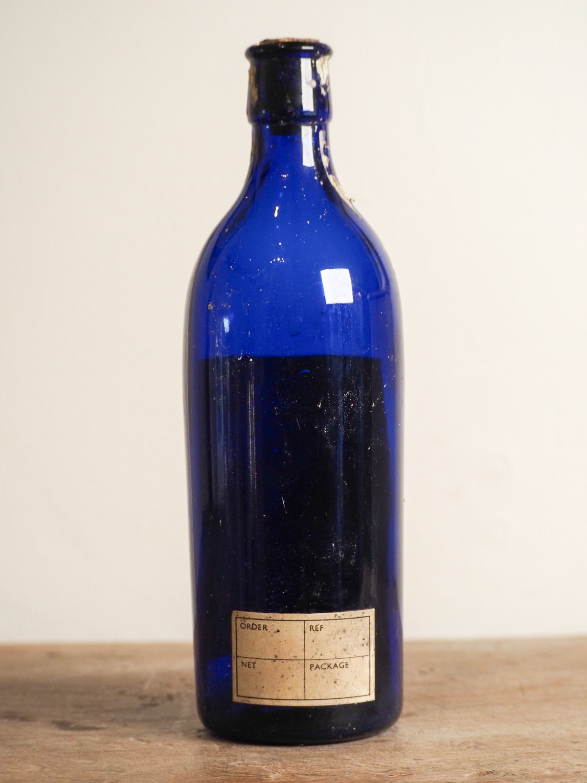 Antique Victorian Blue Bottle with Stopper and Original Label -Sold Individually