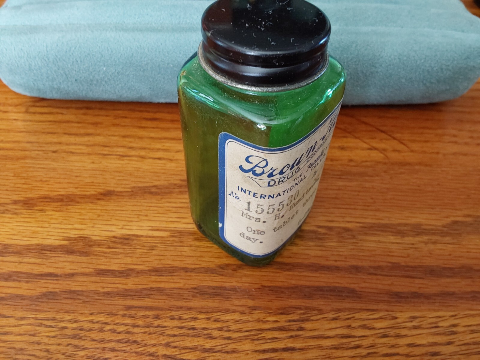 VTG Green Glass Prescription Bottle 1952 Brown Hoselton Int Falls, Minnesota