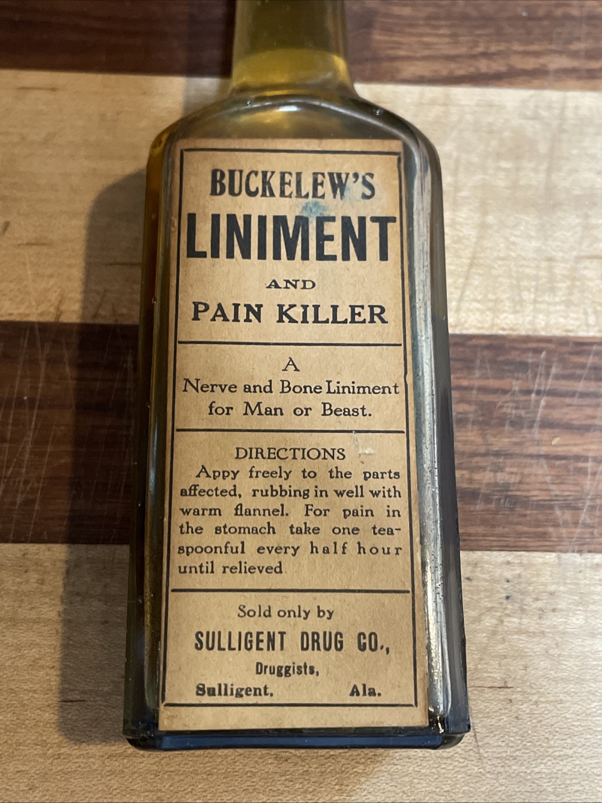 ANTIQUE BUCKELEW’S LINIMENT & PAIN KILLER BOTTLE, SULLIGENT ALABAMA DRUG CO.