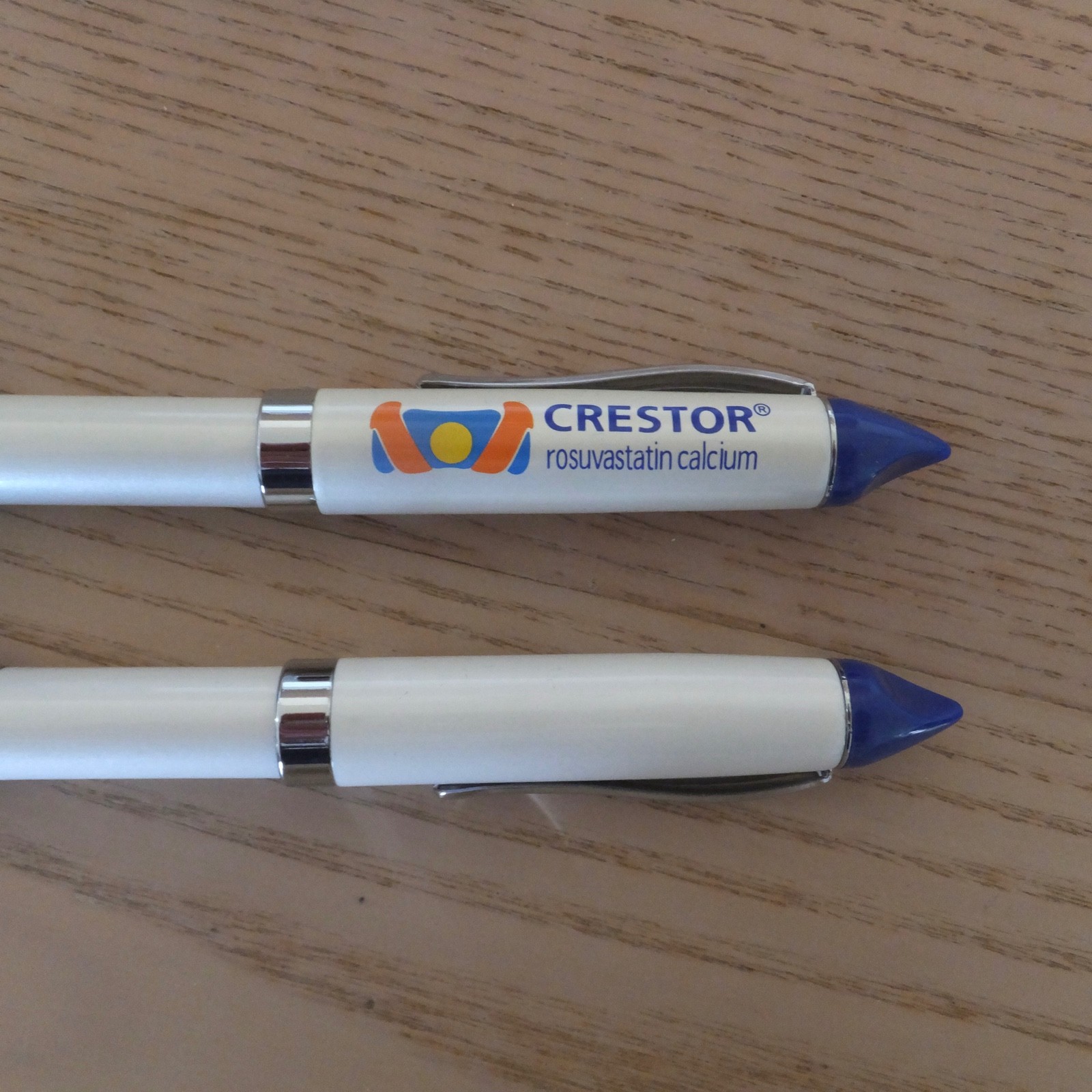2 CRESTOR Pens, Drug Rep Pharmaceutical Advertising, Heavy Metal, Twist