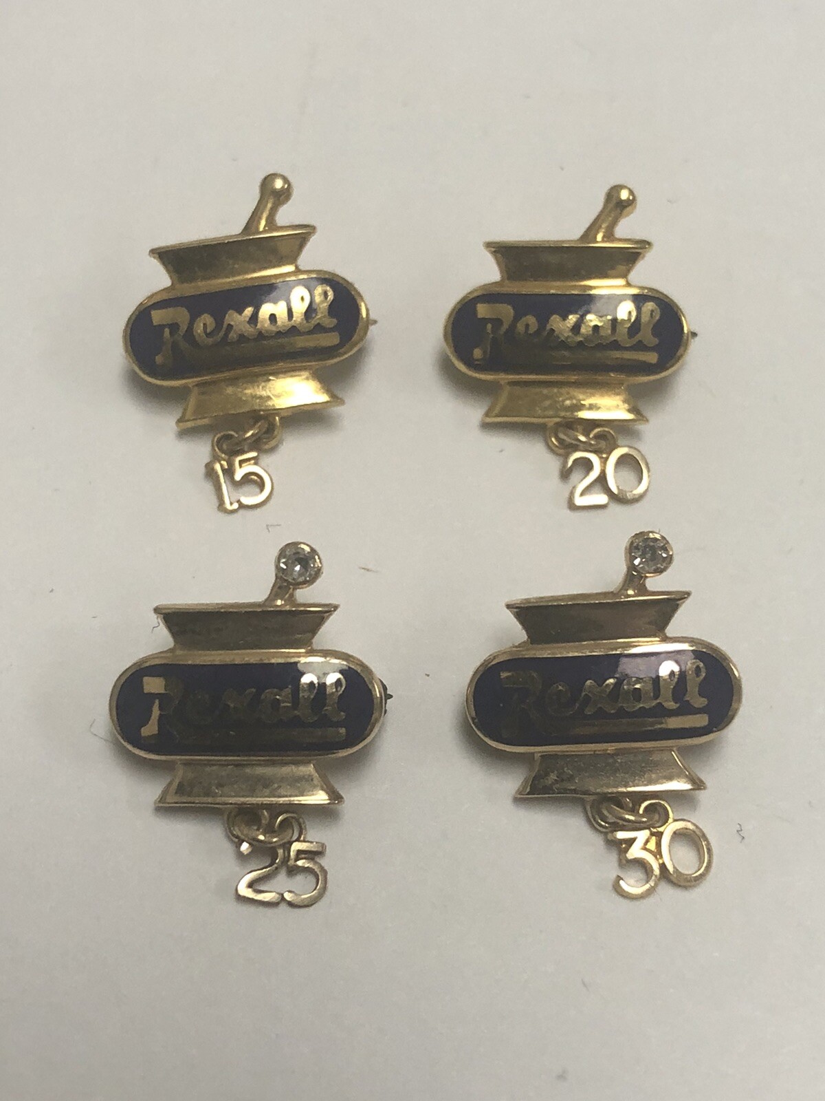 VINTAGE REXALL DRUG SET OF FOUR 14k YELLOW GOLD PINS – 15, 20, 25, 30 YEARS