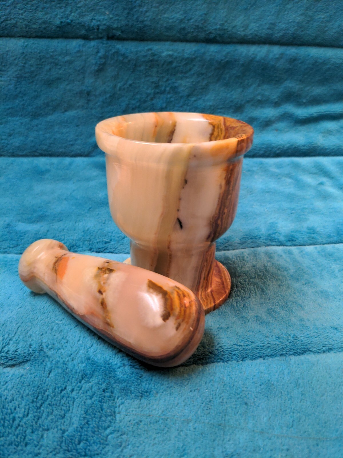 Matching brown and beige Stone apothecary mortar and pestle