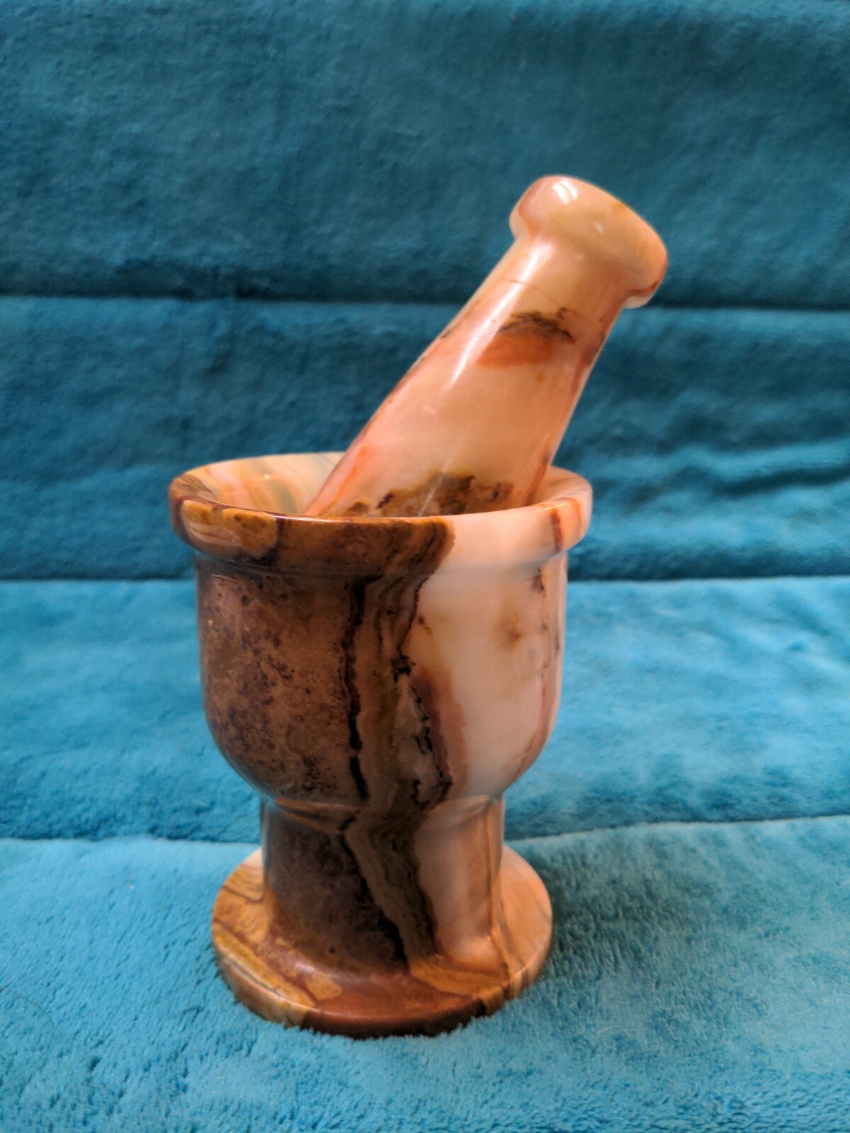 Matching brown and beige Stone apothecary mortar and pestle