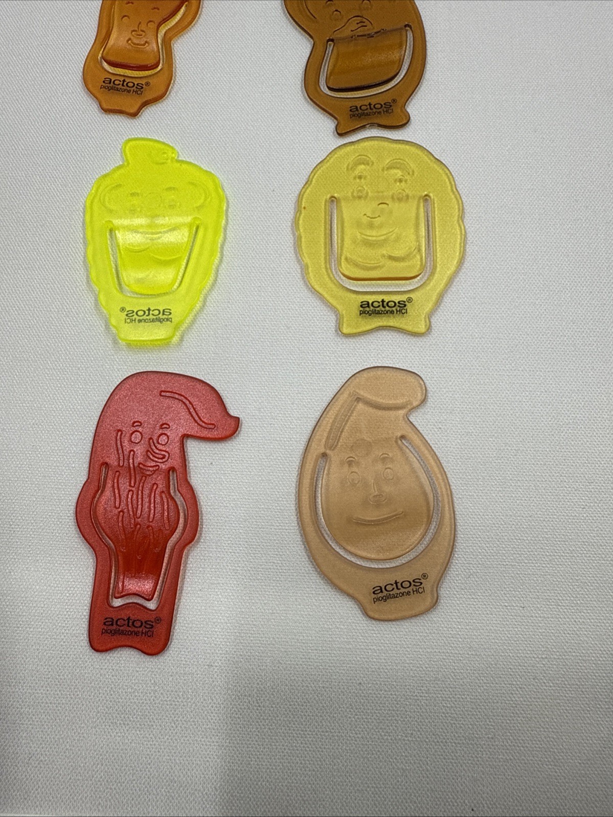 7 Actos MultiColor Paperclips Pharmaceutical Drug Rep Anthropomorphic Rare HTF