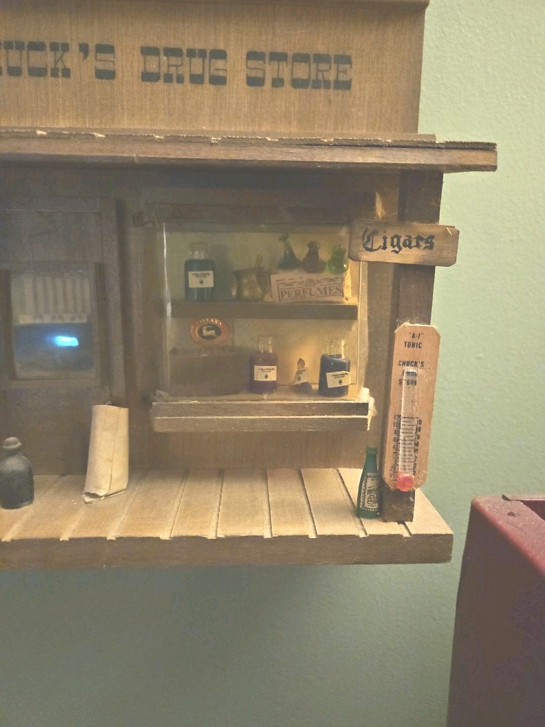 Vintage 3D Wooden Chucks Drug Store 8.5×9