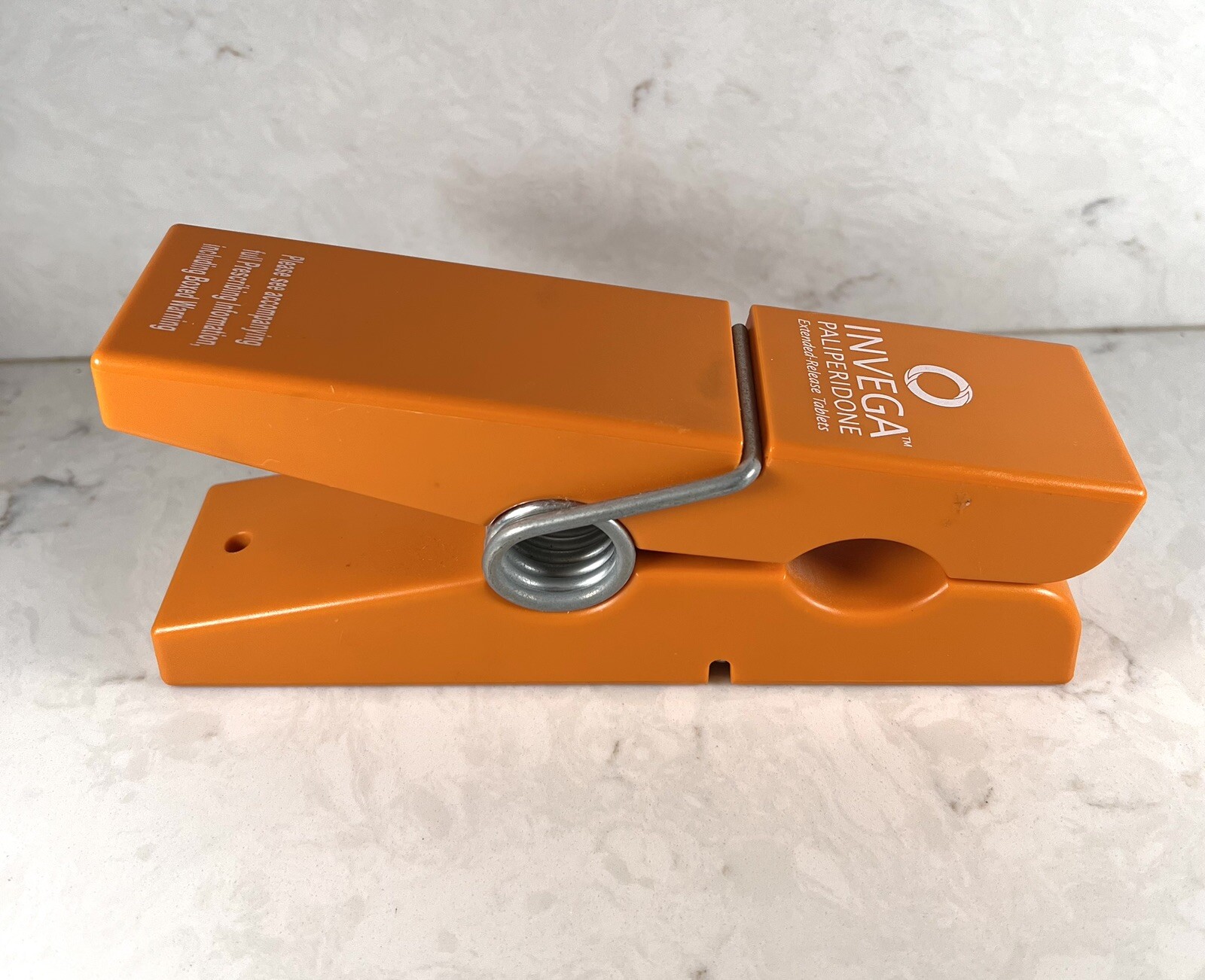Medical Advertisement Promotional Invega Paliperidone XL Orange Clothespin Desk