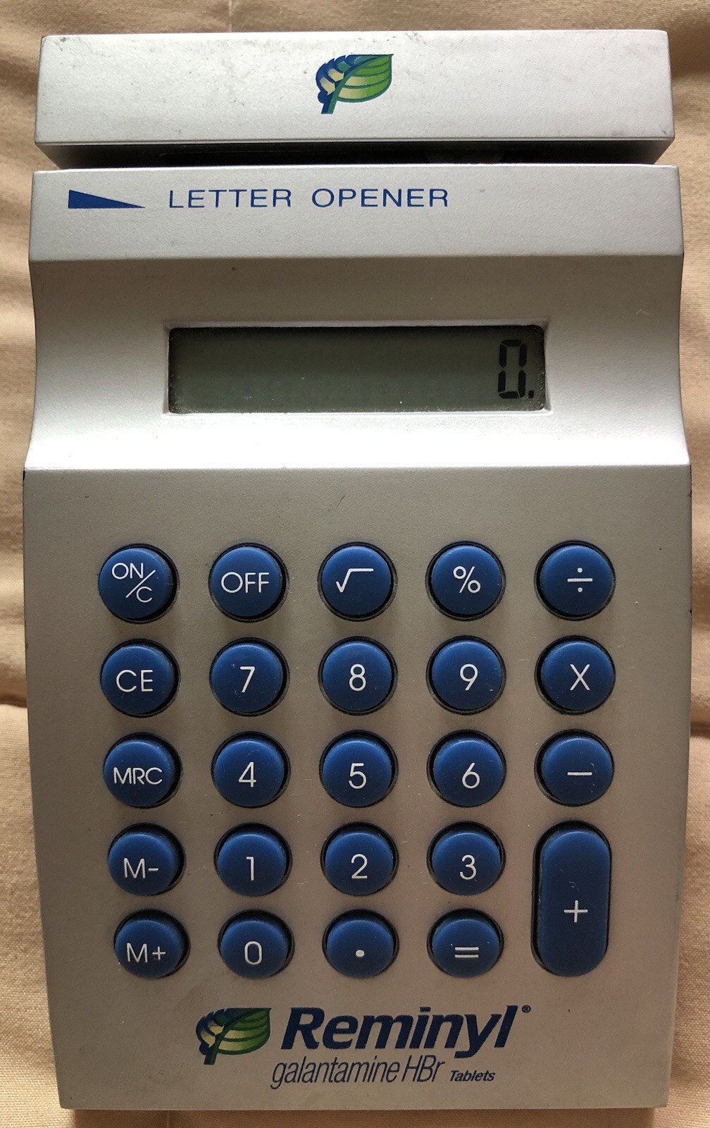 Reminyl (Galantamine) Calculator & Letter Opener- Great condition.