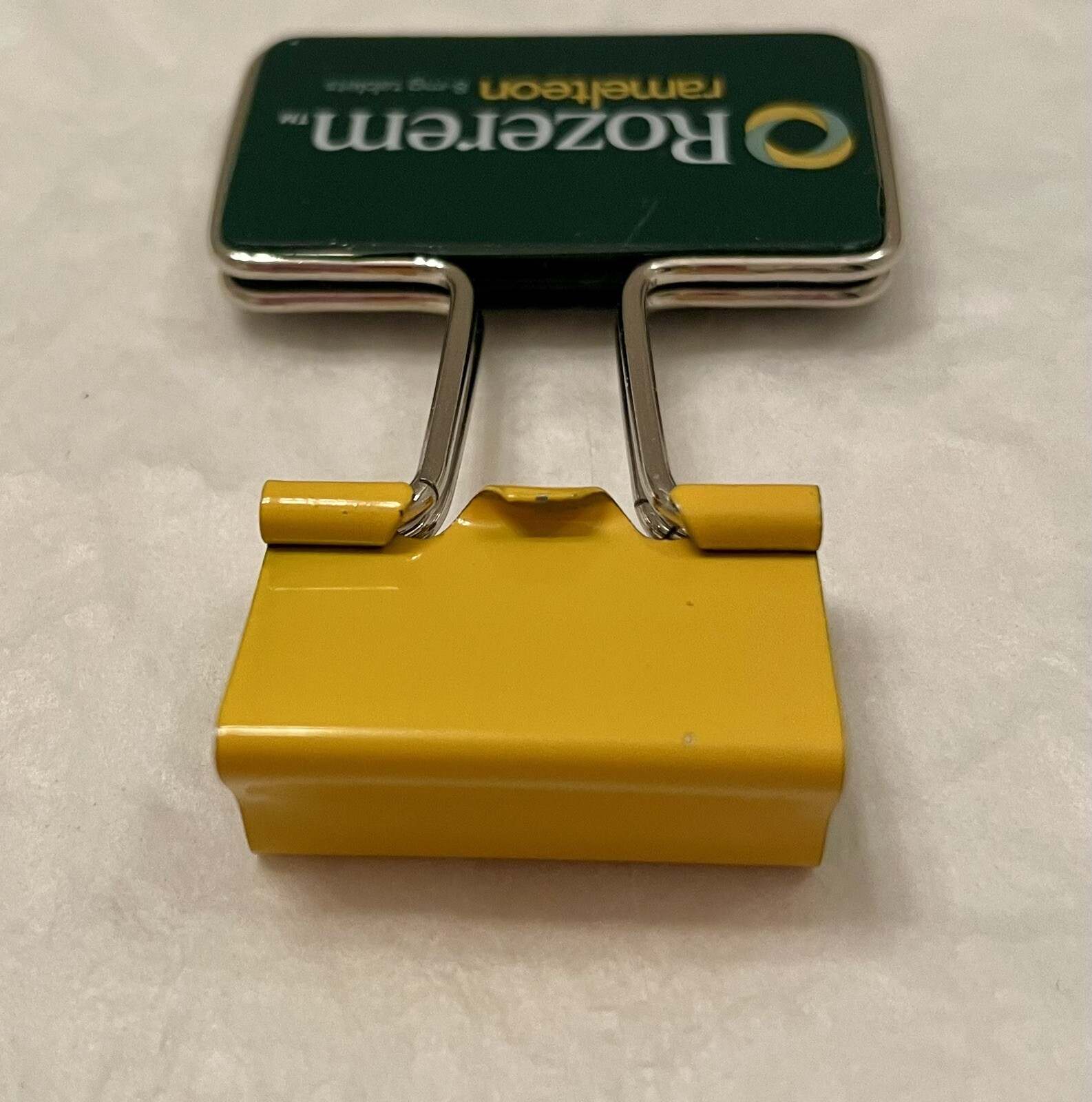 VINTAGE ROZEREM GREEN/YELLOW BINDER CLIP PHARMACEUTICAL DRUG REP LOGO NEW