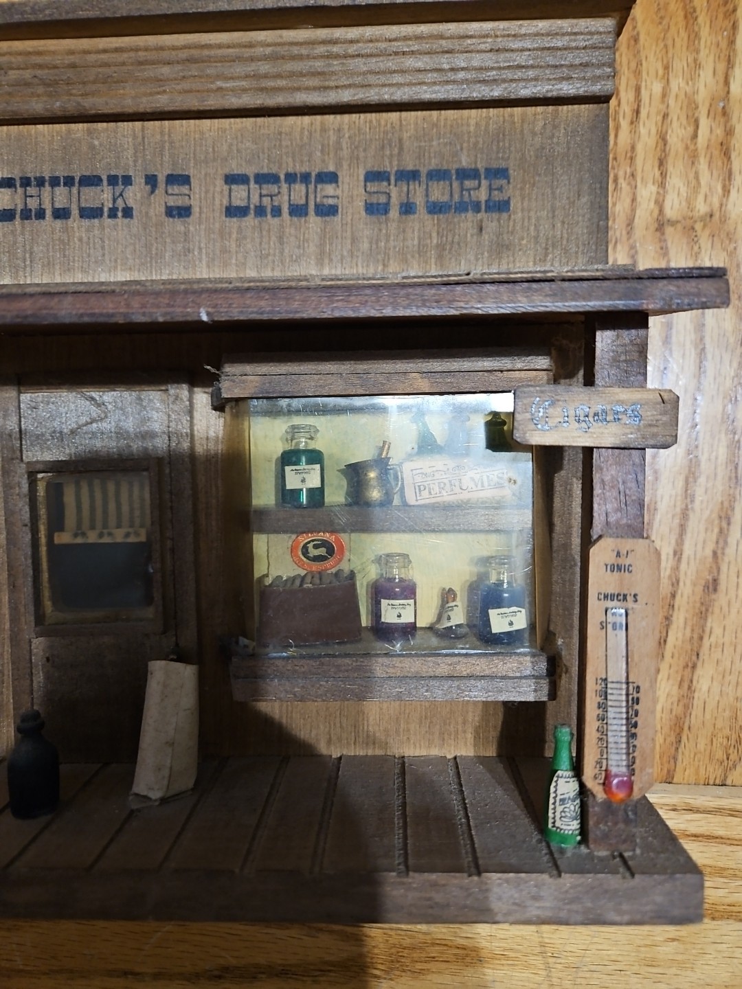 Vintage 3D Wooden Chucks Drug Store 8.5×9
