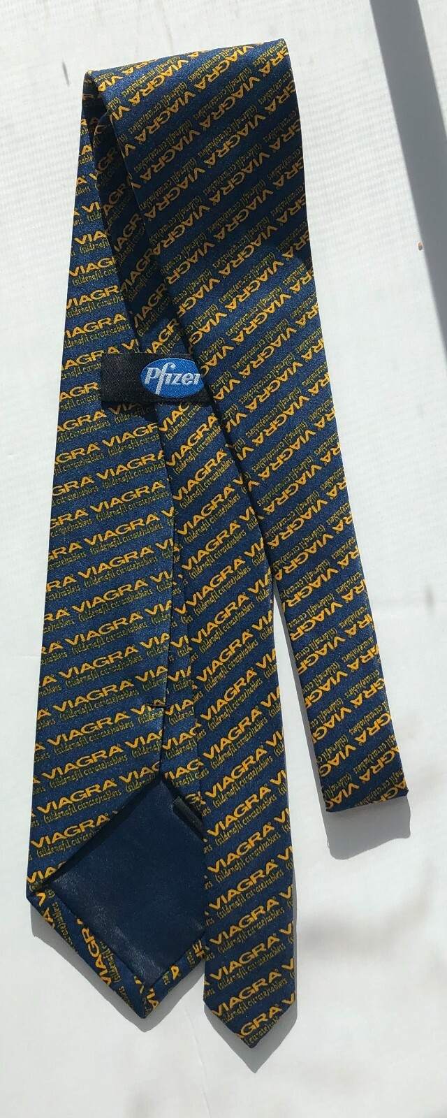 Pfizer Viagra  Neck tie New . Viagra printed with yellow on dark blue