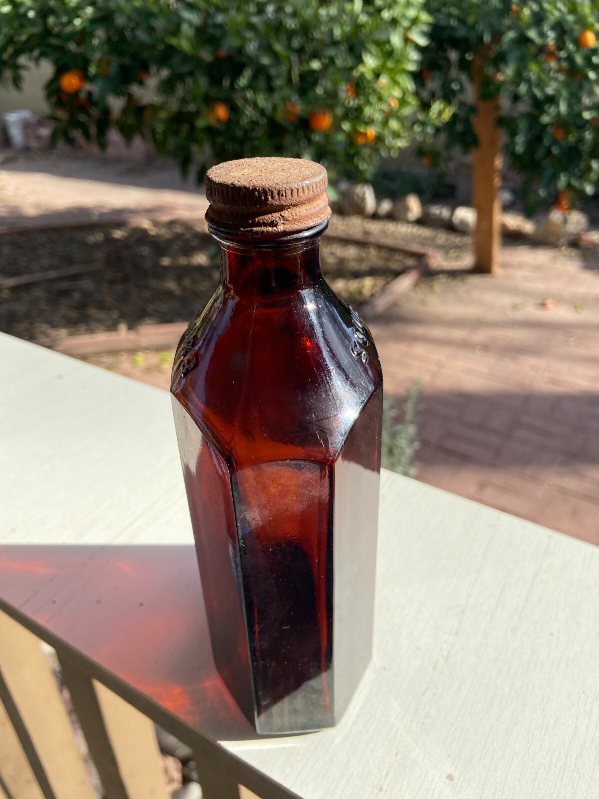 BEAUTIFUL Antique Amber Squibb embossed Glass Drug or Pharmacy Jar, 7” Tall