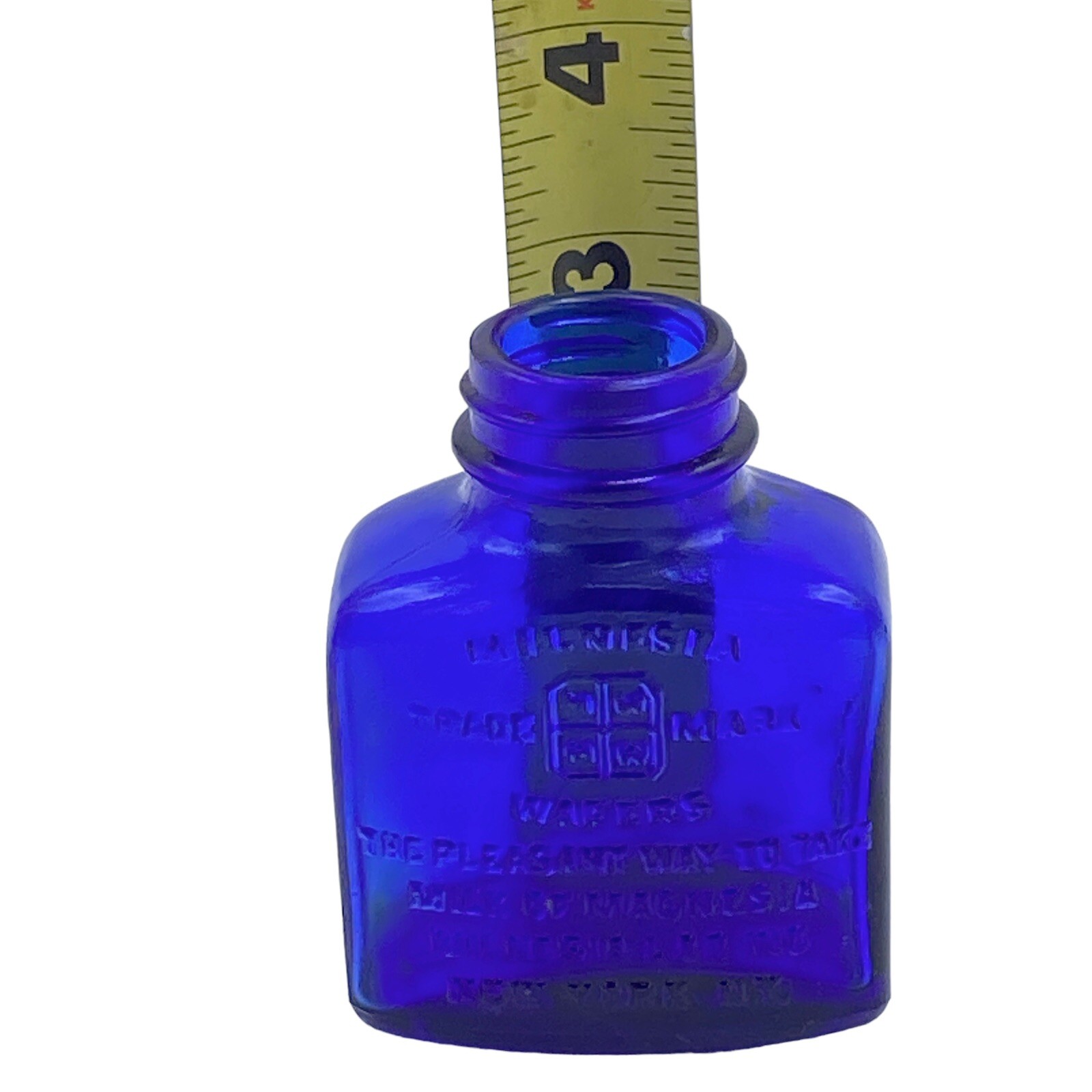 Vtg Milnesia Wafers Embossed Cobalt Blue Glass Bottle 3″ Tall New York, NY
