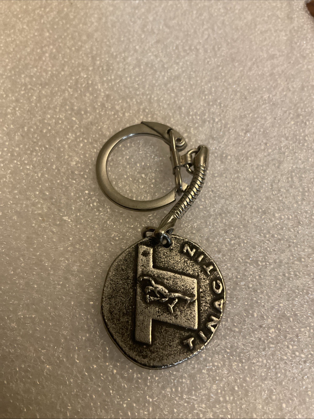 vintage TINACTIN pharmaceutical Keychain token ornate old coin metal