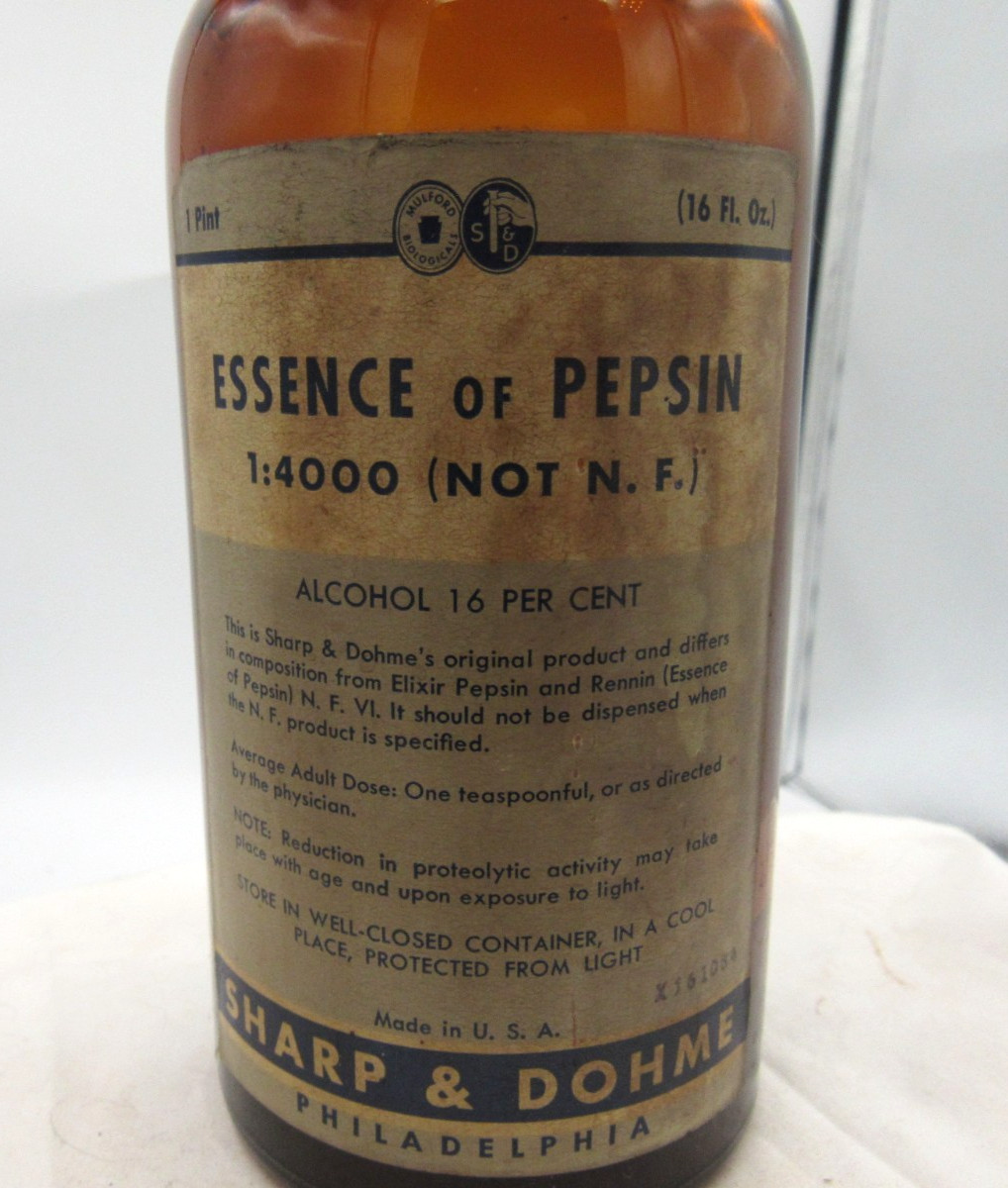 BW – 1940’s Sharp & Dohme Essence of Pepsin 7 1/2″ Amber Medicine bottle