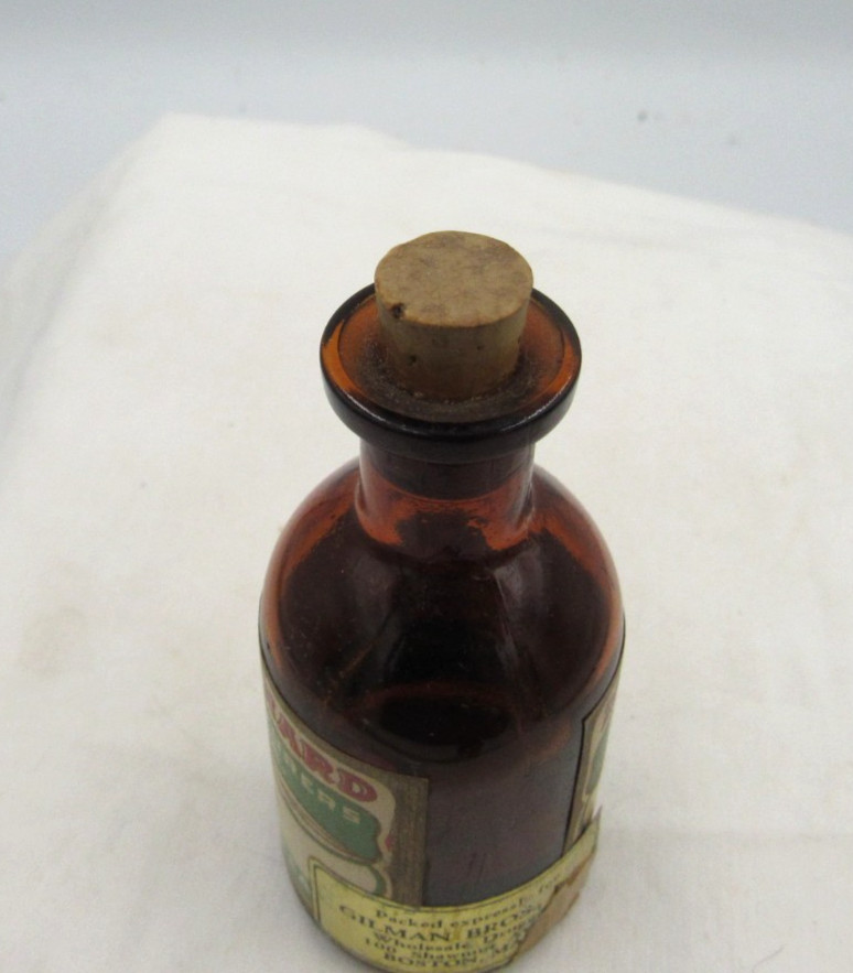 BW – 1920’s Magnus, Mabee & Reynard Oil of Nutmeg 3 1/4 ” Amber Medicine bottle