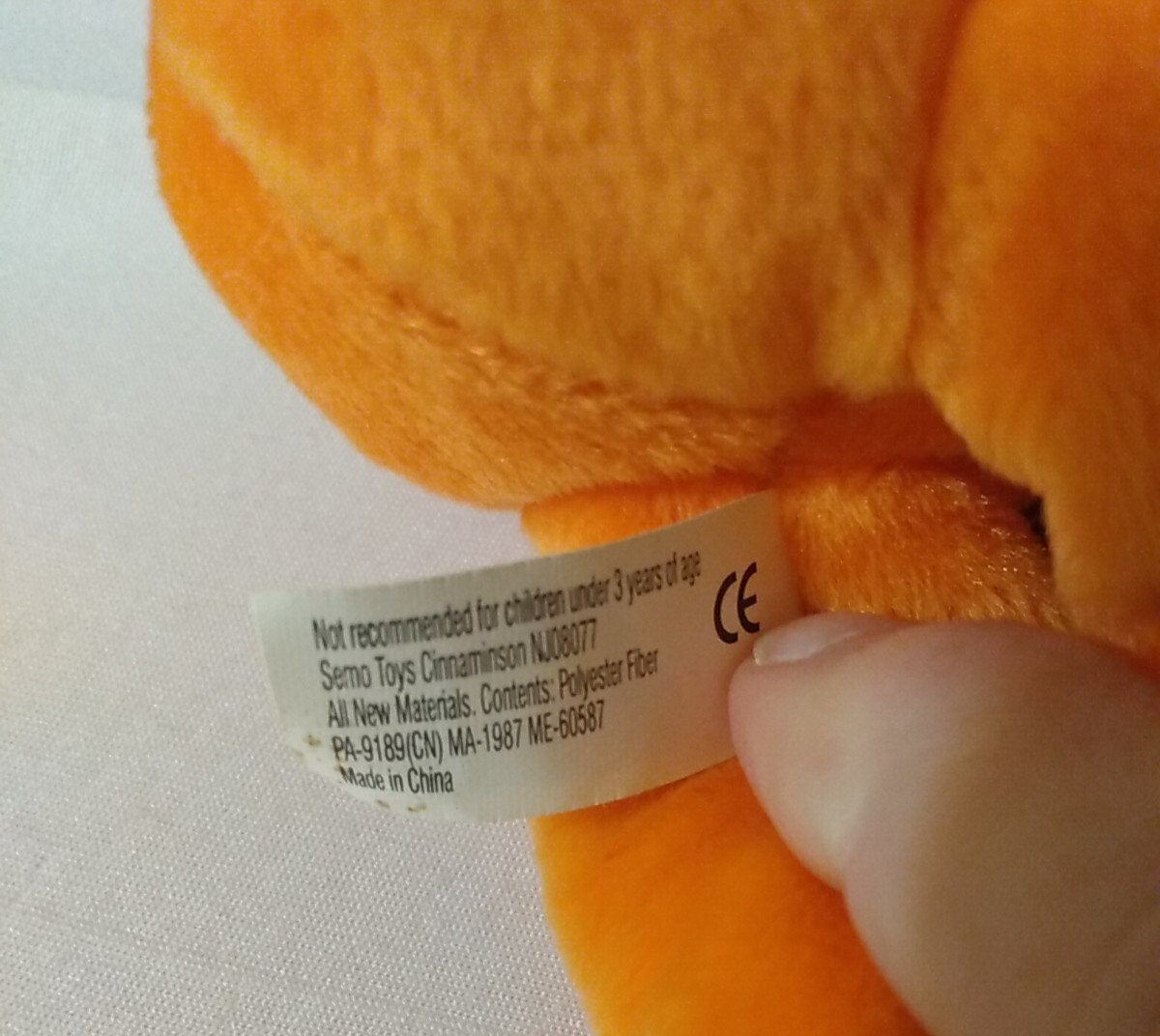 Orange Monkey Plush Holding Ball Toy 8″ Pharmaceutical advertisingSemo