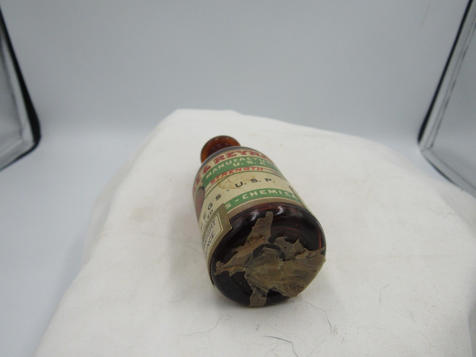 BW – 1920’s Magnus, Mabee & Reynard Oil of Nutmeg 3 1/4 ” Amber Medicine bottle