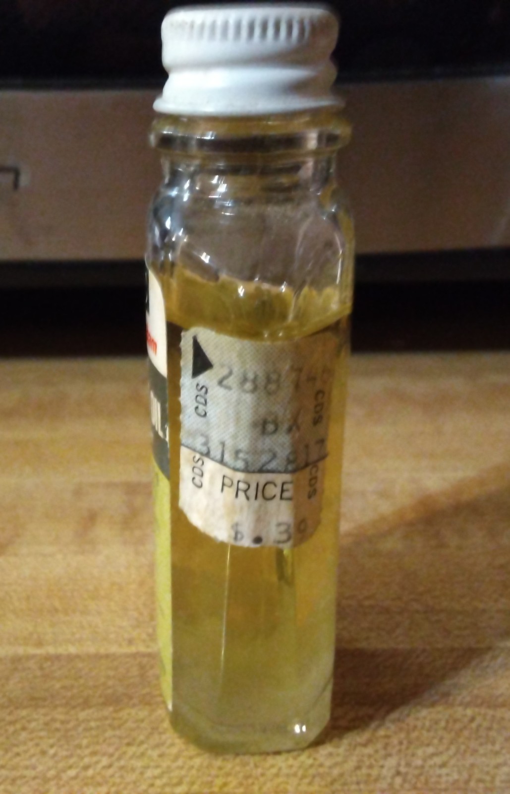 Vtg CUNNINGHAM Sweet Oil Emollient 1oz Glass Mini Glass Bottle 3/4 Full PROP TAG