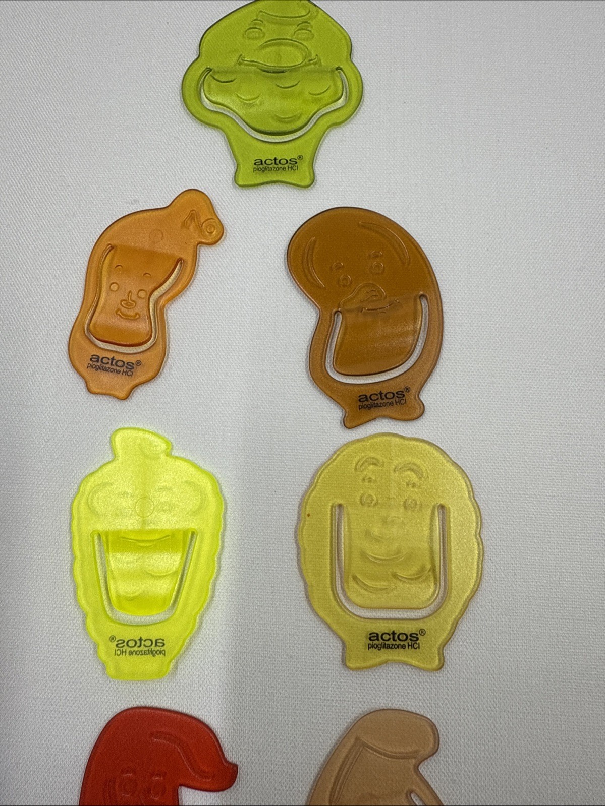 7 Actos MultiColor Paperclips Pharmaceutical Drug Rep Anthropomorphic Rare HTF