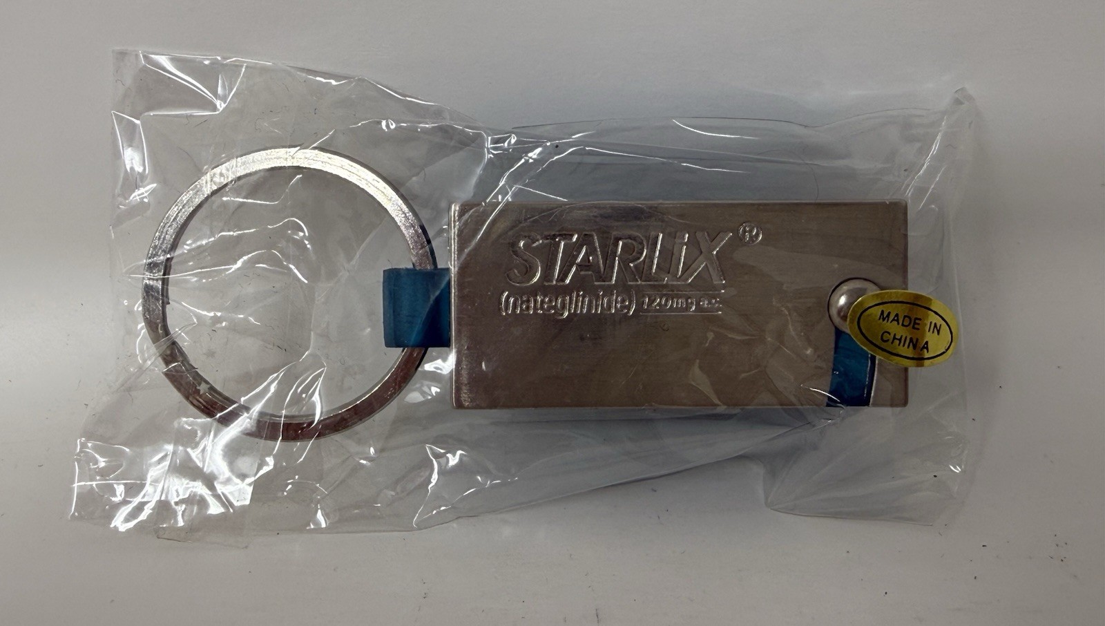 Starlix Pill Box Key Chain Ring Pharmaceutical Drug Representative Advertisement