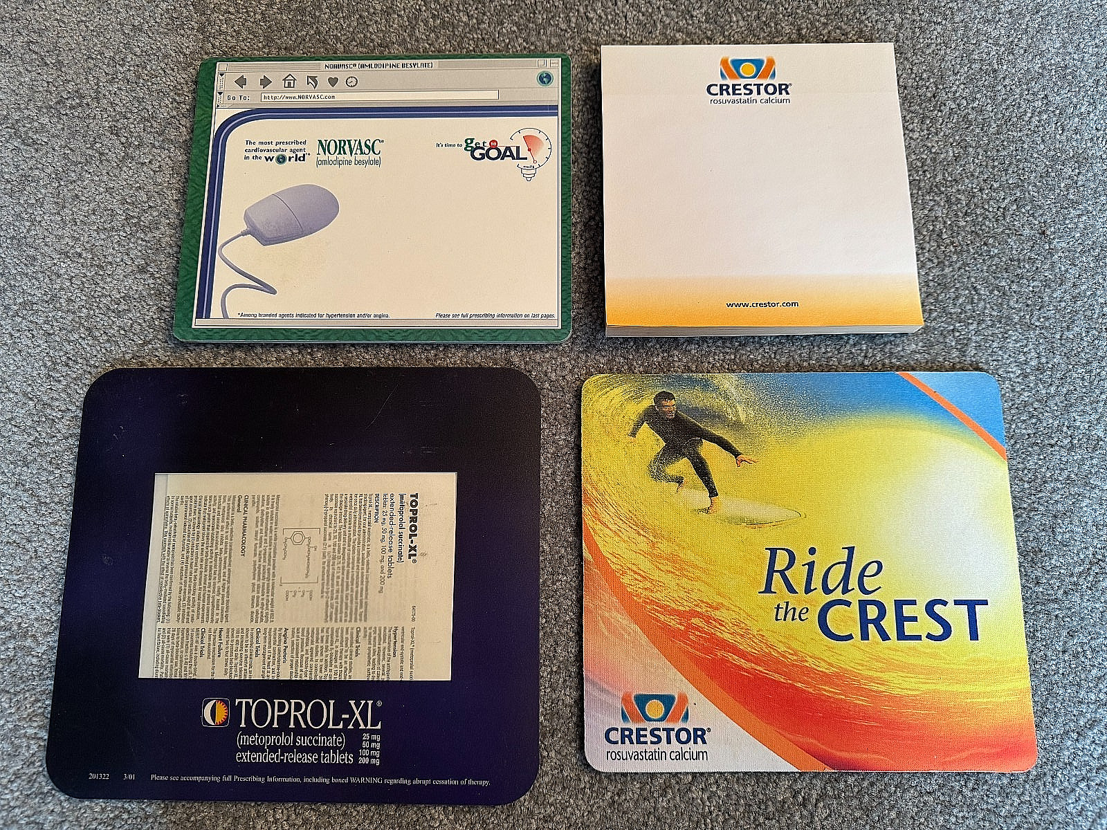 from pharma rep: 2 unusual paper pads + 2 mouse pads (Crestor, Norvasc, Toprol)