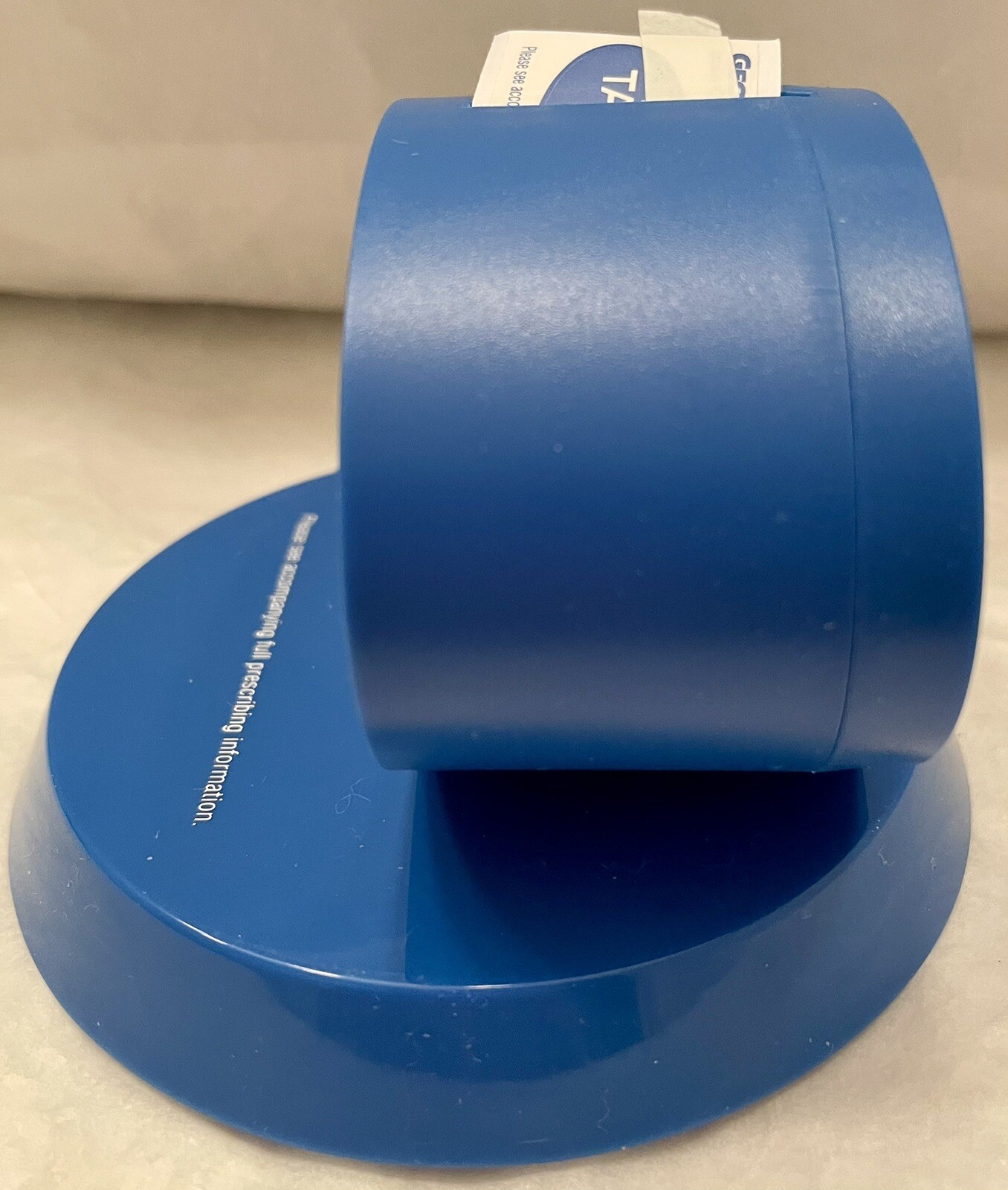 VTG GEODAN 2006 BLUE STICKER DISPENSER/PAPERWEIGHT Pharma Advertising Rep Logo