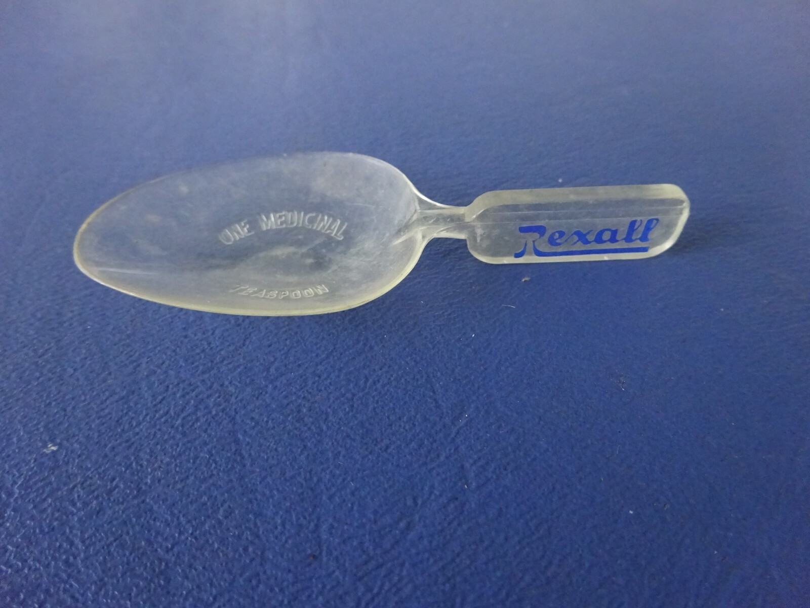 1950’s Rexall rug Brochure and Measuring spoons