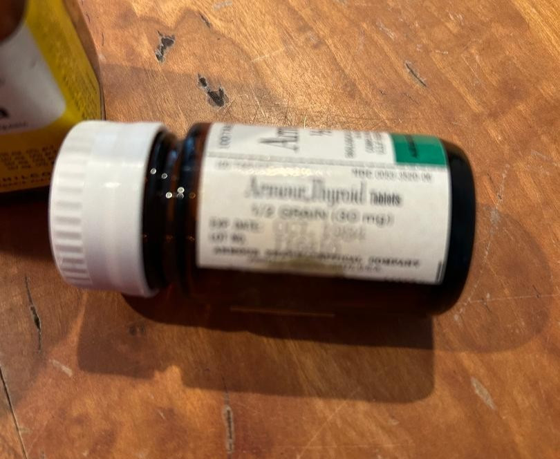 4 glass medicine bottles, Thyroid, Iodin ration, Pyridium Tri-Sulfa, Toryn Syrup