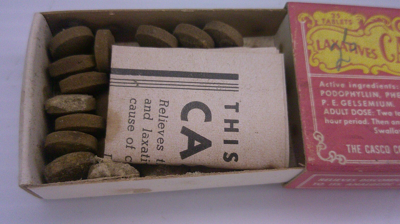 vintage Casco co laxative pills sliding box opener has pills & instructions Z151