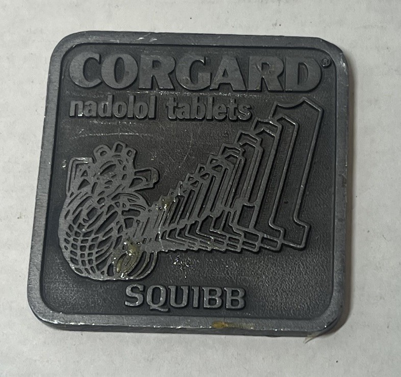 Vtg Metal Advertising Paperweight SQUIBB Medicine Drug Corgard Nadolol Tablets