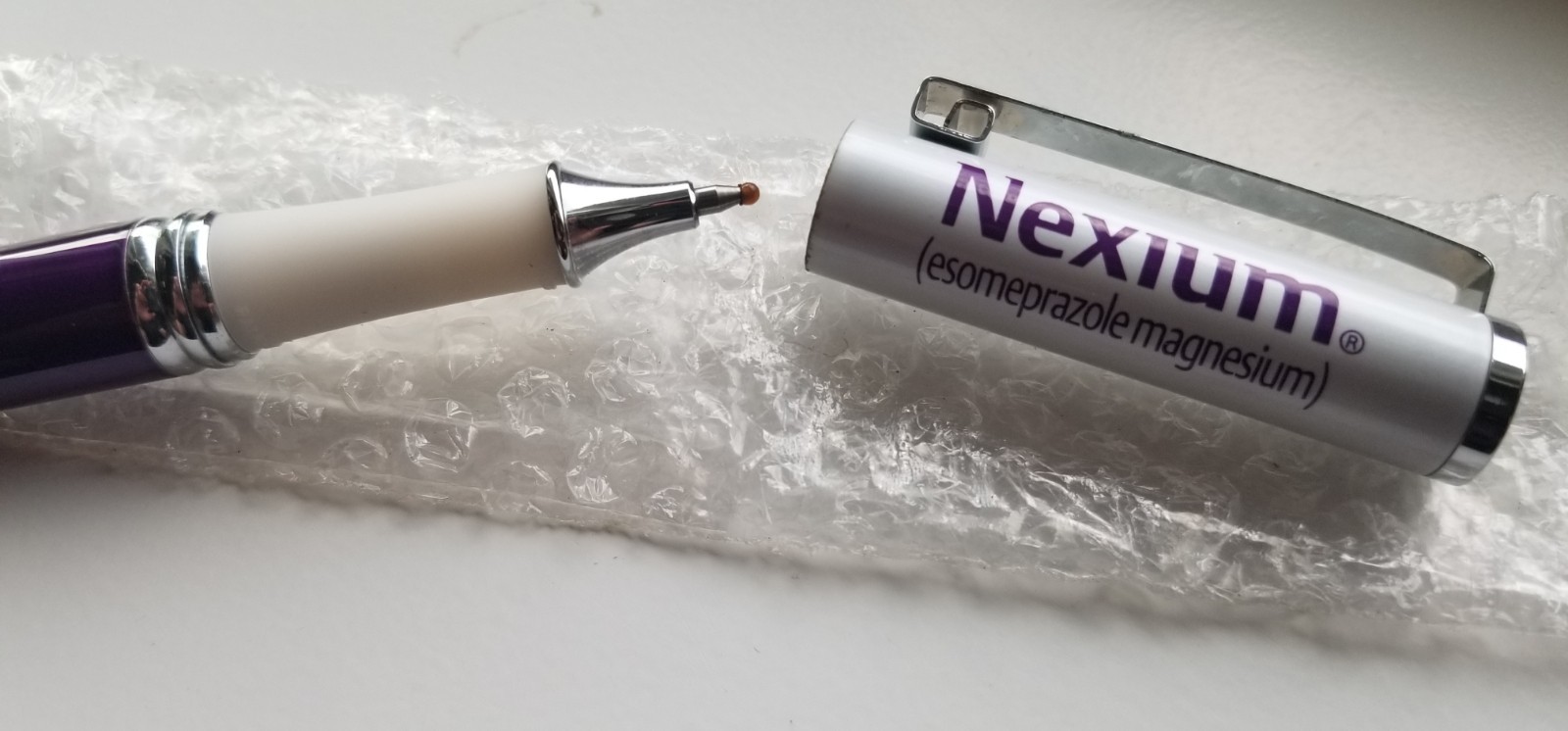 Nexium Heavy Metal Archimedes Pen – Pharmaceutical Drug Rep Promotional Item