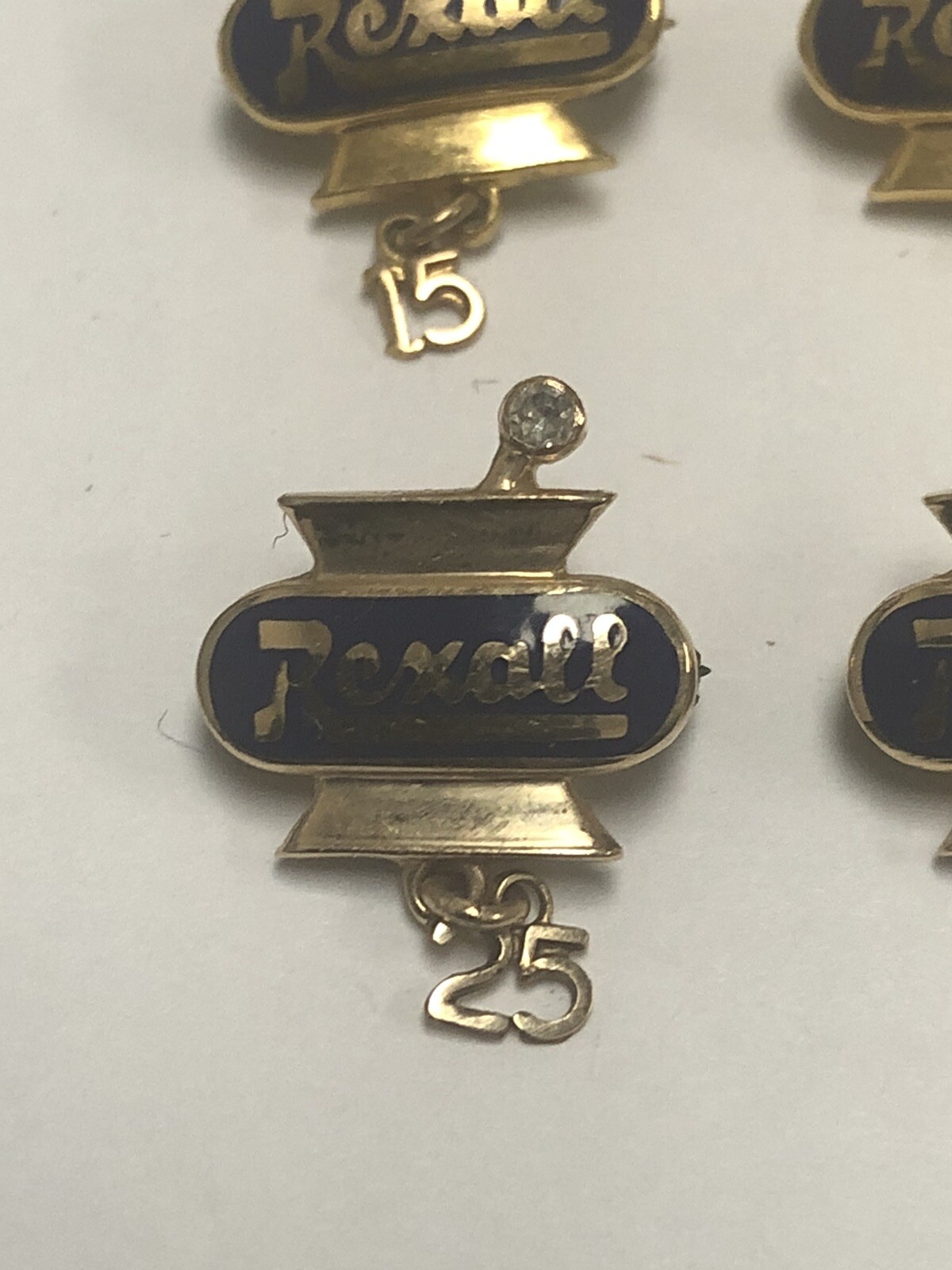VINTAGE REXALL DRUG SET OF FOUR 14k YELLOW GOLD PINS – 15, 20, 25, 30 YEARS