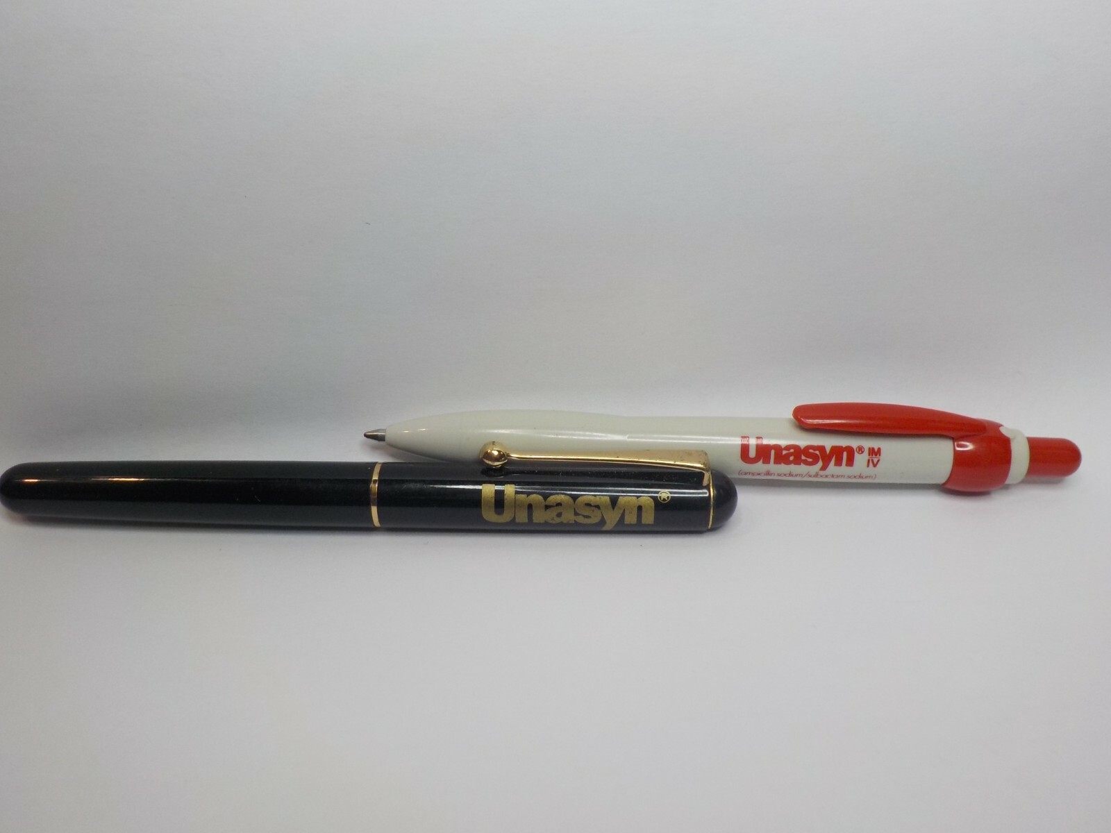 ROERIG UNASYN DRUG REP PEN LOT OF 2 METAL & PLASTIC