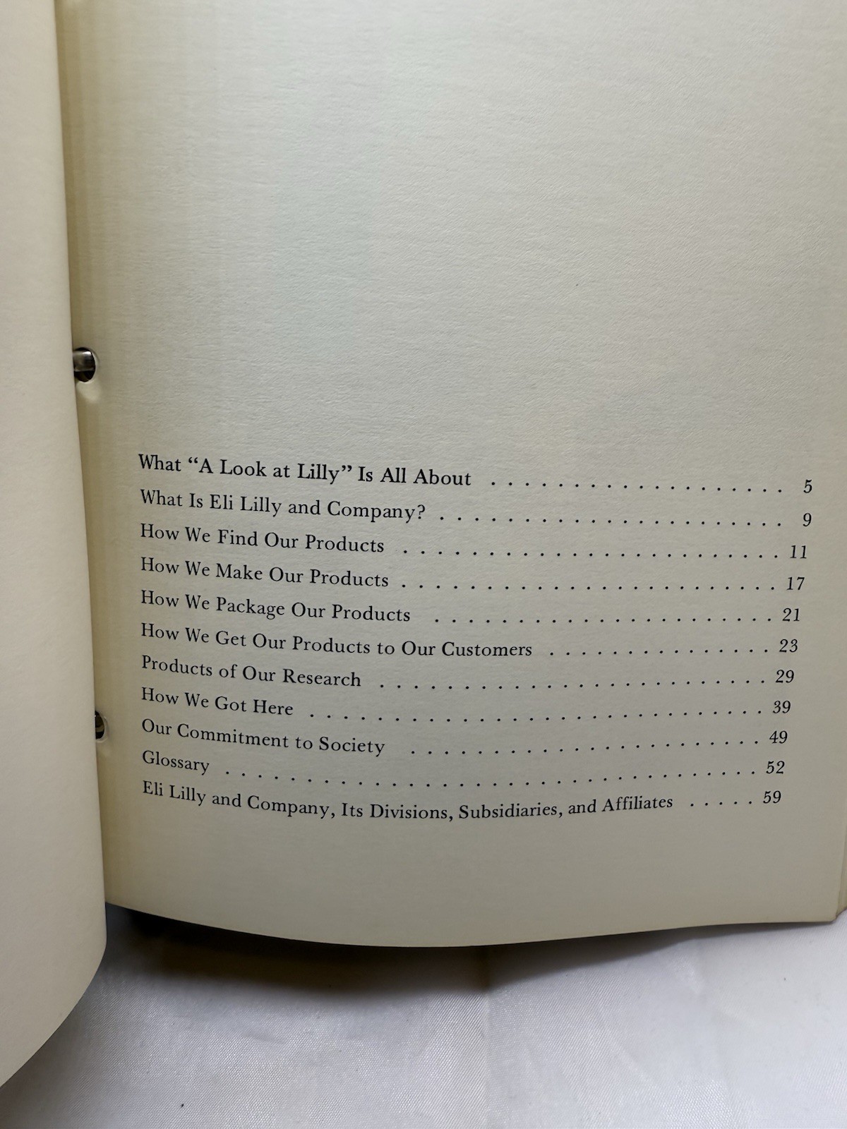 1976 Eli Lilly Employee Information binder – pay, insurance, credit union info