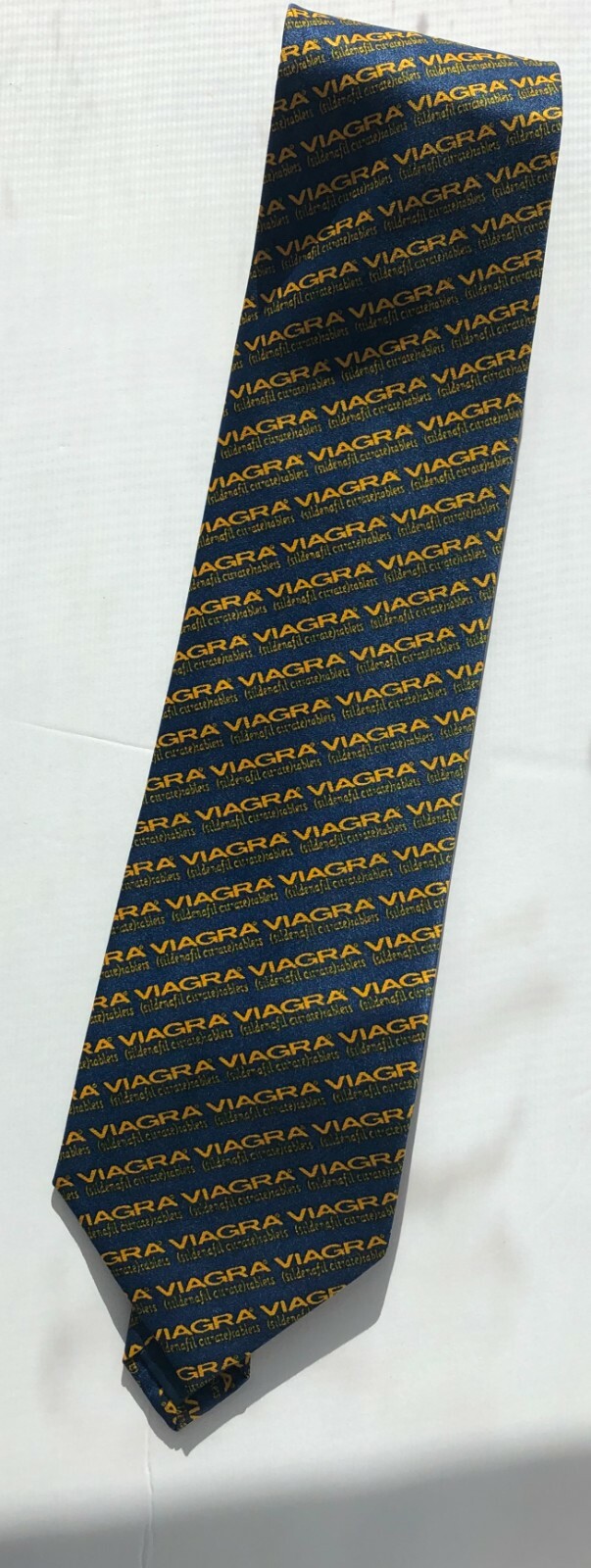 Pfizer Viagra  Neck tie New . Viagra printed with yellow on dark blue