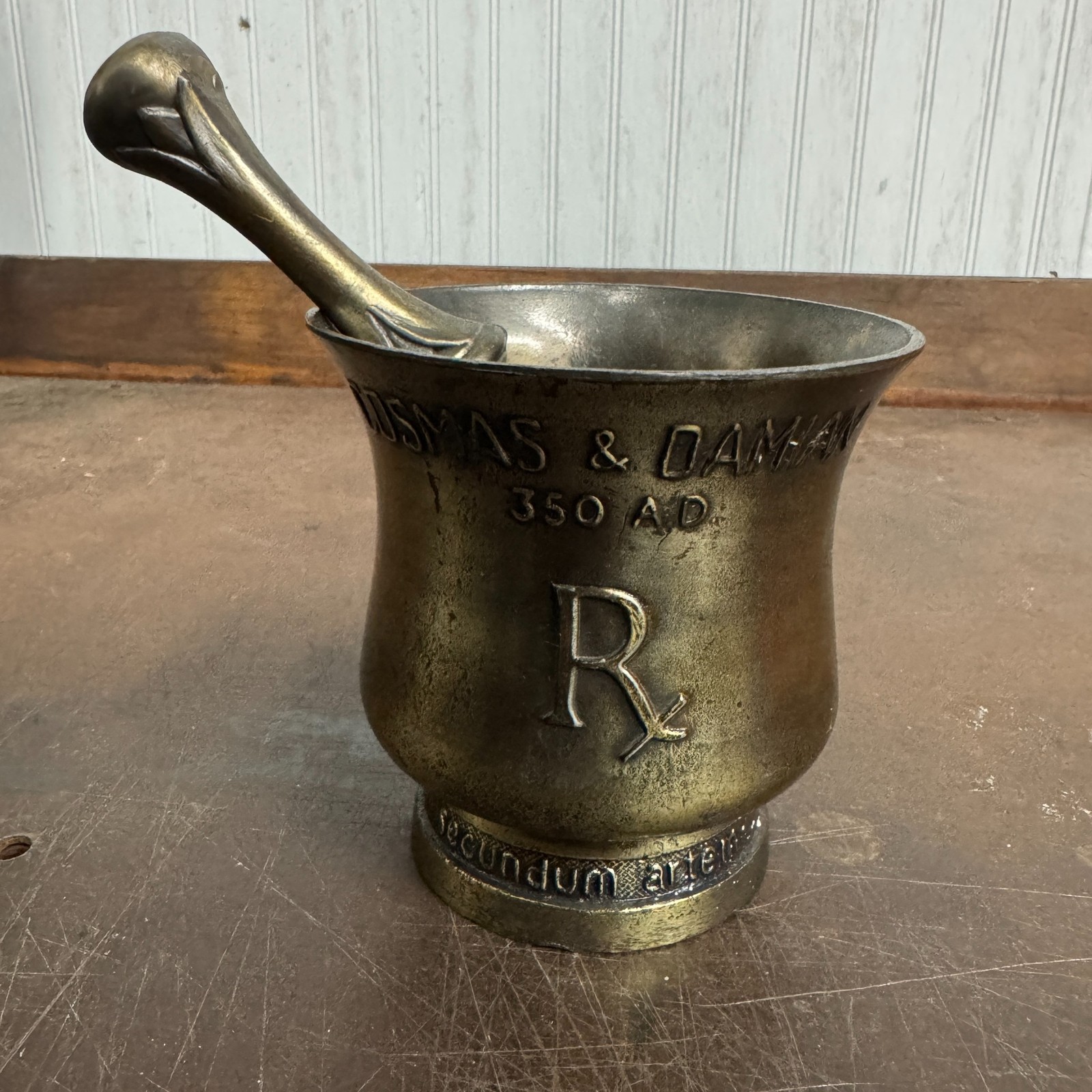 Vtg CORICIDIN Advertising Motor & Pestle Apothecary / Pharmacy – Cosmas & Damian