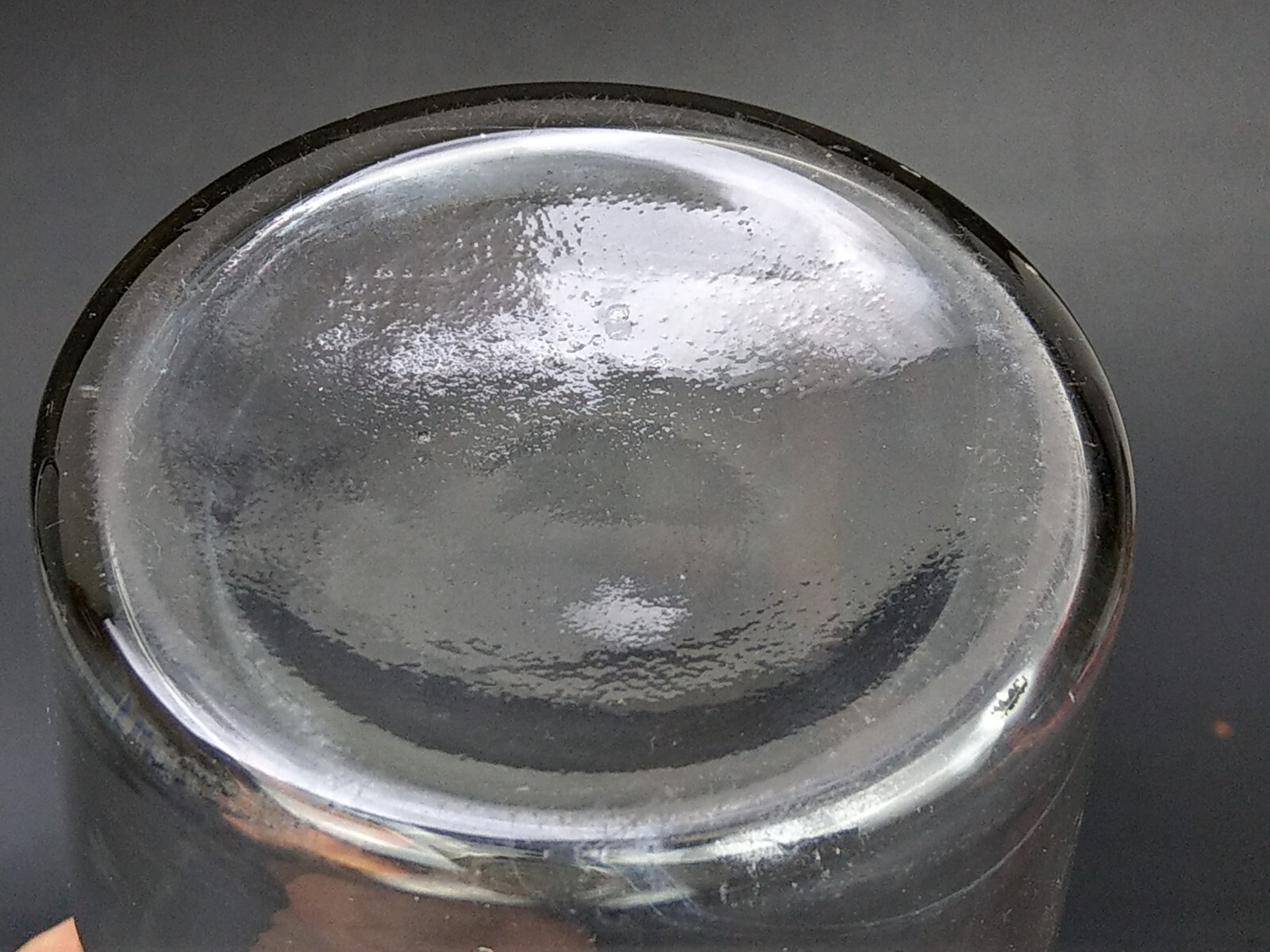 Antique chemist clear bottle with flat stopper This clear glass bottle from the