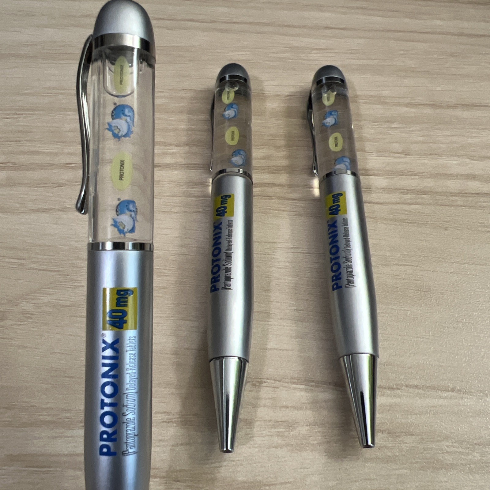 Set of 3 PROTONIX Collectible Heavy Metal Pharmaceutical Pens, Floating Gerdy