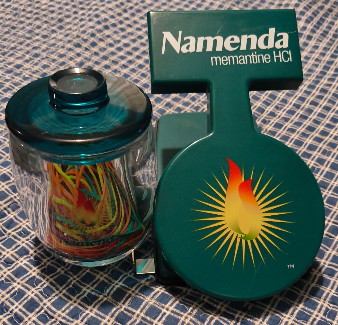 Pharmaceutical Drug Rep Lot Namenda Jar With Lid W/ Rubber Bands & 2 Hole Punch