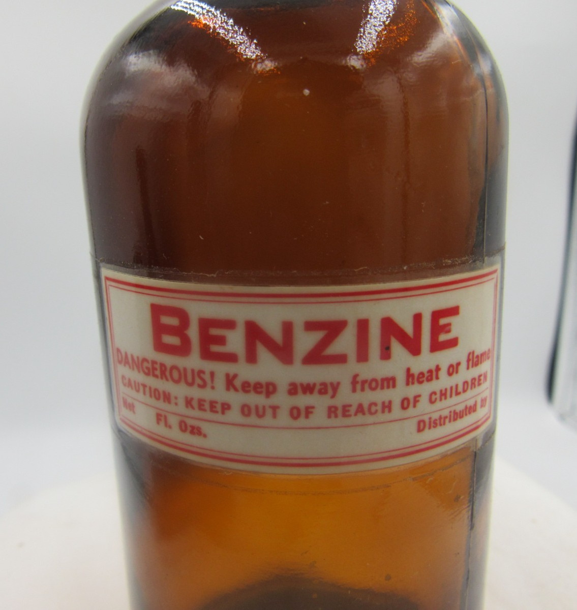 CT26 – 1976 Benzine 6″ Amber Paper labeled EMPTY Medicine bottle