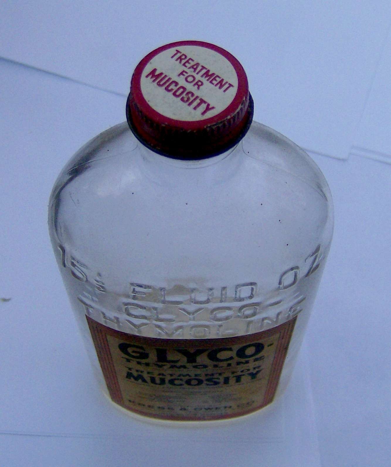 antique 1960s TREATMENT FOR MUCOSITY glass pharmaceutical bottle Glyco-Thymoline